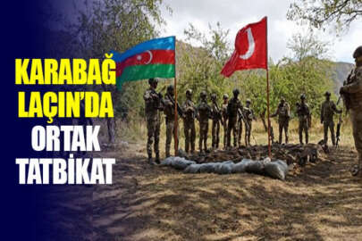 Aliyev, Laçin’de Azerbaycan bayrağını göndere çekti